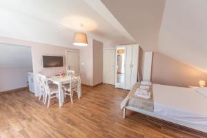 Postel nebo postele na pokoji v ubytování Ioannis Apartments