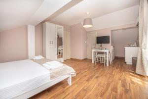 Postel nebo postele na pokoji v ubytování Ioannis Apartments