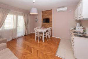 Kuchyň nebo kuchyňský kout v ubytování Ioannis Apartments