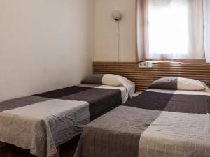 Posteľ alebo postele v izbe v ubytovaní FRENTE AL MAR-Wifi FREE
