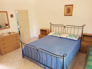 Postel nebo postele na pokoji v ubytování Villa Cino