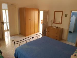 Postel nebo postele na pokoji v ubytování Villa Cino
