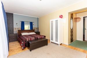 Кровать или кровати в номере Guest House Rannaliiv