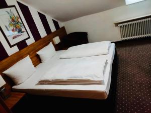 Postel nebo postele na pokoji v ubytování Hotel Relax