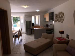 Kuchyňa alebo kuchynka v ubytovaní Apartments Trlika