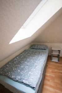 Postel nebo postele na pokoji v ubytování Heidehaus Lippl am Steinhuder Meer