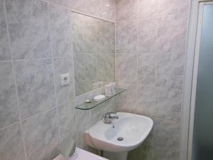 Koupelna v ubytování Apartma Jadran + 14 fotografií