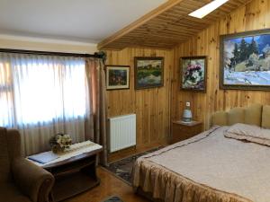 Postel nebo postele na pokoji v ubytování Villa Arefyevykh