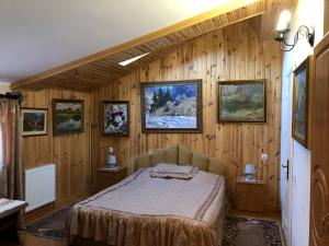Postel nebo postele na pokoji v ubytování Villa Arefyevykh