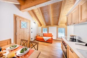 A kitchen or kitchenette at Chalet Resort Sozzine