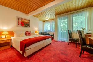 Postel nebo postele na pokoji v ubytování Hotel Neudeck