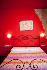 Postel nebo postele na pokoji v ubytování B&B Raffiori
