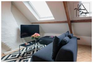 TV a/nebo společenská místnost v ubytování at Home in Bruges