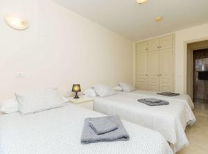 A bed or beds in a room at Fewo Mark