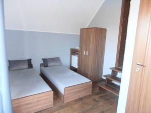 Postel nebo postele na pokoji v ubytování Pokoje u Wiktorii