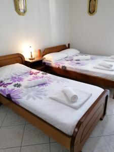 Ein Bett oder Betten in einem Zimmer der Unterkunft NEW PANORAMA STUDIOS