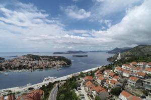 a view of a city and a body of water at Rooms Monika in Dubrovnik