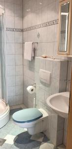 a bathroom with a toilet and a sink at Vila Jela in Baška Voda +53 photos