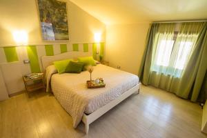 Postel nebo postele na pokoji v ubytování B&B Antiche Mura