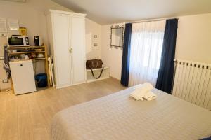Kuchyň nebo kuchyňský kout v ubytování B&B Antiche Mura + 31 fotografií