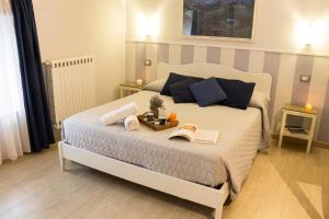 Postel nebo postele na pokoji v ubytování B&B Antiche Mura