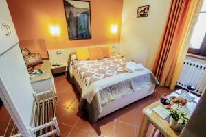 Postel nebo postele na pokoji v ubytování B&B Antiche Mura