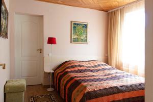 Ένα ή περισσότερα κρεβάτια σε δωμάτιο στο Guest house Rasa