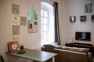 TV a/nebo společenská místnost v ubytování Bingo Apartman
