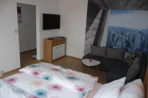 Posteľ alebo postele v izbe v ubytovaní Apartman Q11