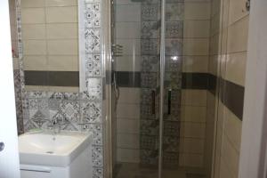 Koupelna v ubytování Apartman Q11 + 19 fotografií