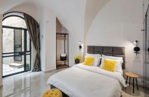 Old City Boutique Hotel客房内的一张或多张床位