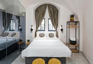 Old City Boutique Hotel客房内的一张或多张床位