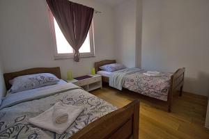 Postel nebo postele na pokoji v ubytování Beachfront House Amaris