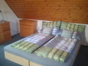Postel nebo postele na pokoji v ubytování Chata Zahrada Madeta