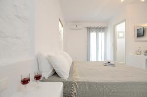 Кровать или кровати в номере Casa Verde Di Naxos