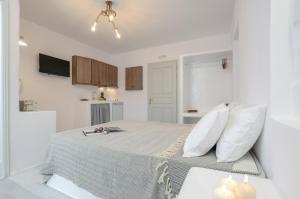 Кровать или кровати в номере Casa Verde Di Naxos