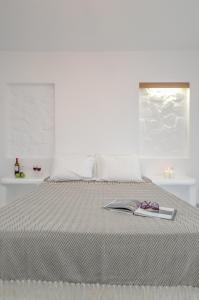 Кровать или кровати в номере Casa Verde Di Naxos