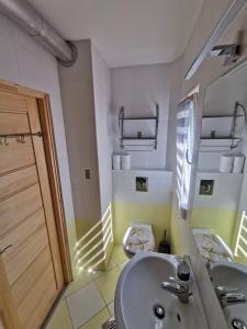 Ванная комната в Pelso Apartman