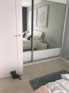 Postel nebo postele na pokoji v ubytování Studio 33 z Ogrodem