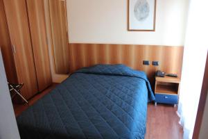 Postel nebo postele na pokoji v ubytování Hotel Selide