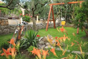 Um jardim em APARTMANI SARLIJA