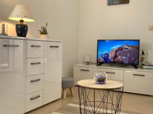 TV a/nebo společenská místnost v ubytování Apartment Tihana
