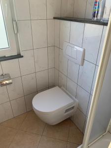 Koupelna v ubytování Apartments Dumančić