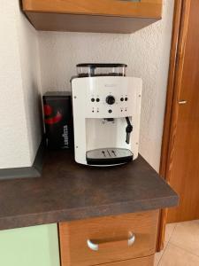 Kuchyň nebo kuchyňský kout v ubytování Apartments Dumančić