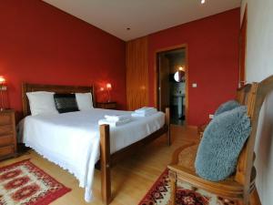 En eller flere senge i et værelse på Gerês e Cabreira - Casa Alexandrina Vilar