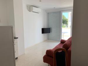 TV a/nebo společenská místnost v ubytování Apartments Dumančić