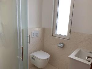 Koupelna v ubytování Apartments Dumančić