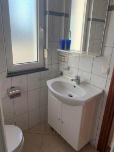 Koupelna v ubytování Apartments Dumančić