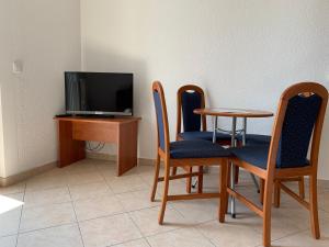 TV a/nebo společenská místnost v ubytování Apartments Dumančić
