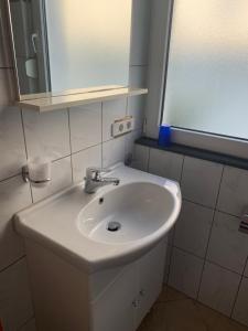 Koupelna v ubytování Apartments Dumančić